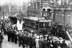 Old tram in Swansea's Wind Street with a workers' demonstration in progress
