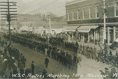 Washington State College Rooters (Fans) marching down Main Street in Moscow, Idaho