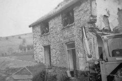 Demolition of a house at Upper Dolhelfa