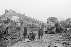 Coventry. Rescue workers arrive to search through rubble and identify the dead