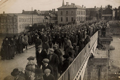 British soldiers walk across the bridge at Athlone after handing over the barracks to Ireland