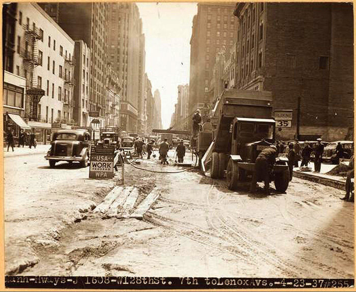 West 57th Street from 7th Avenue, looking east wards and showing the W.P.A. reconstruction work