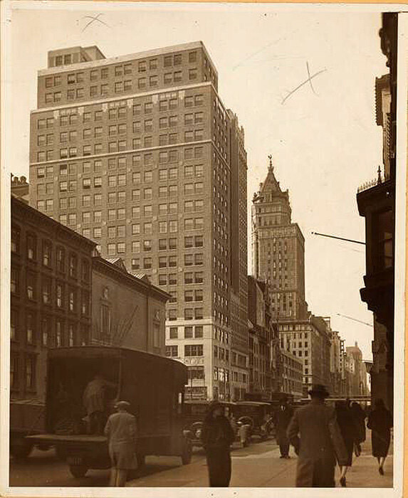 124-128 West 58th Street, south side, west of Sixth Avenue.