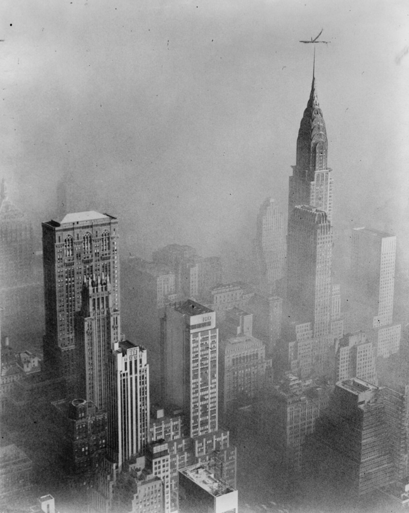 Smog obscures view of Chrysler Building from Empire State Building