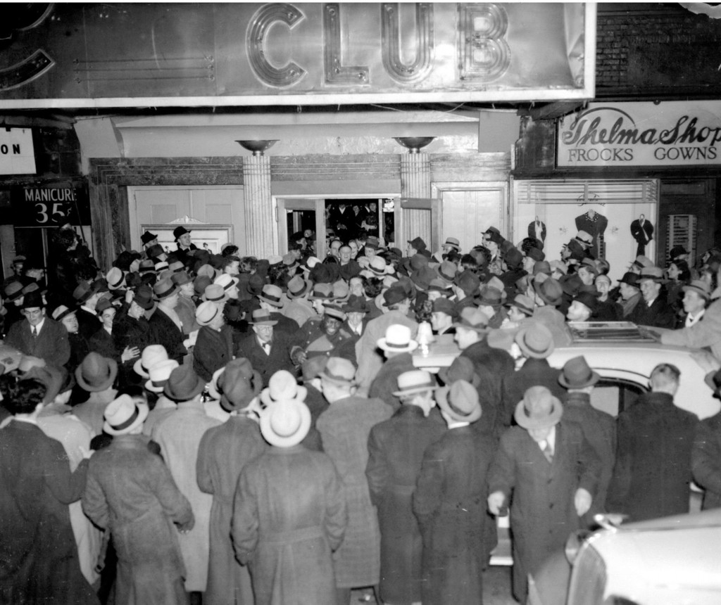 A crowd gathers to catch a glimpse of Marlene Dietrich at the Cotton Club