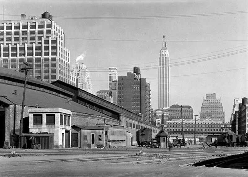 View of the Empire State Building from the New York Central Railroad's rail yards at 30th Street.