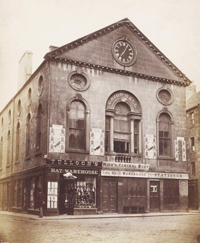 Dundee. General view of Union Hall showing clock, playbills and shop signs