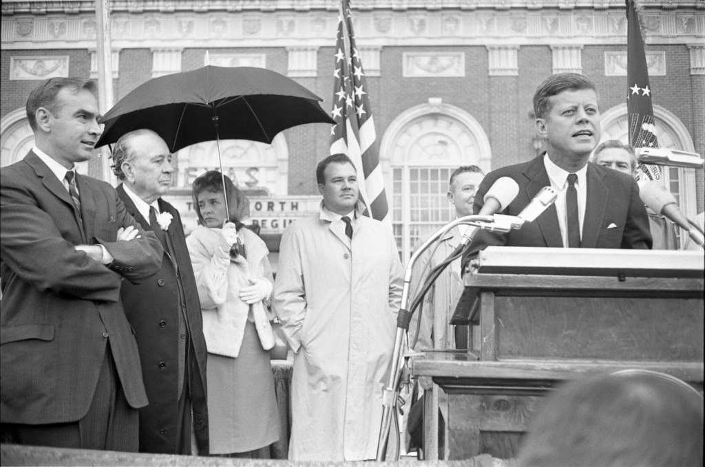 US President John Kennedy on the podium in front of the Texas Hotel