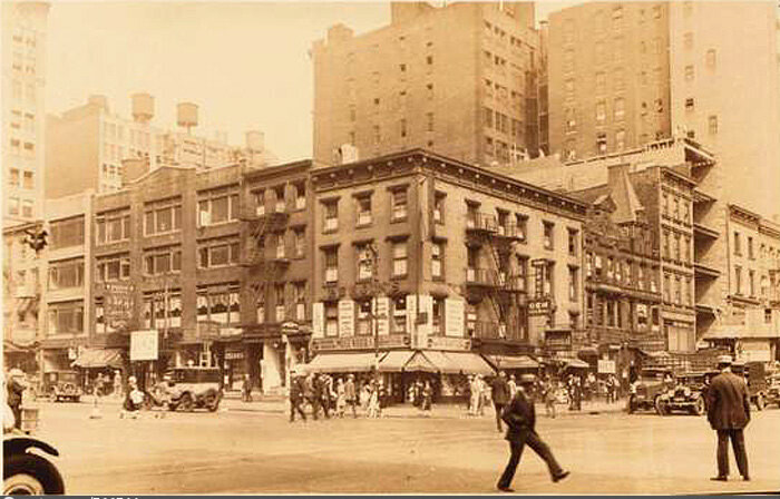 Seventh Avenue at N.E. corner of 23rd Street