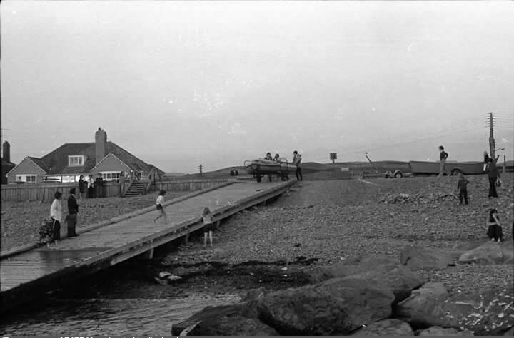 Launching boats from the slipway at Borth