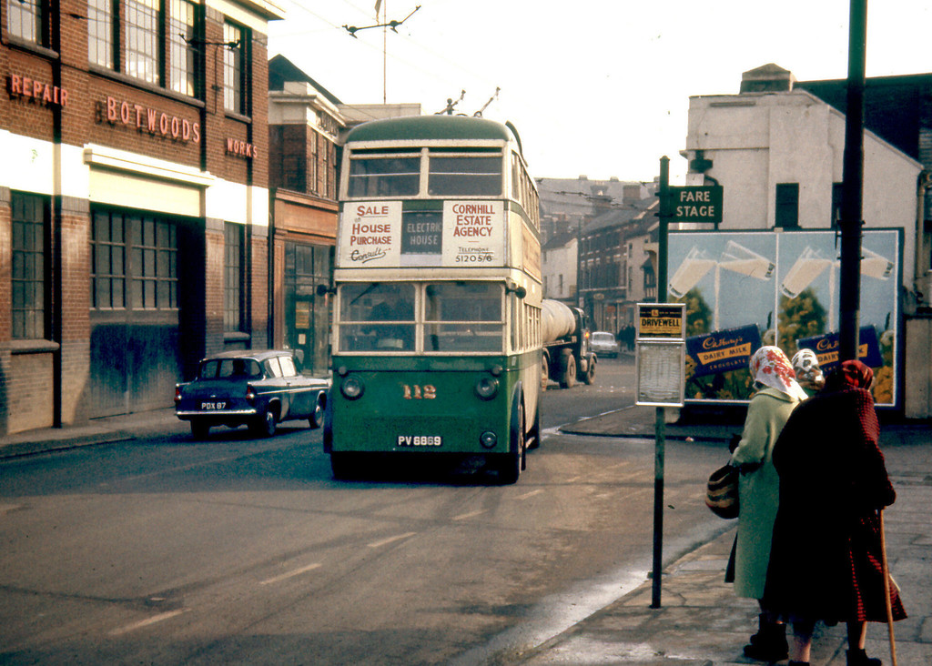 A trolley bus approaches a stop in St Margarets Street