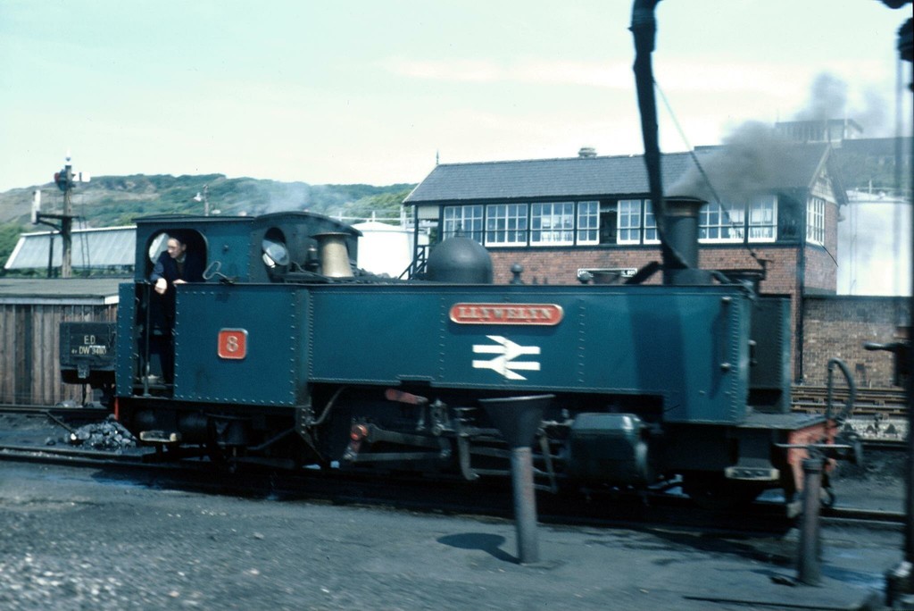 Llywelyn locomotive filling up with water outside the shed