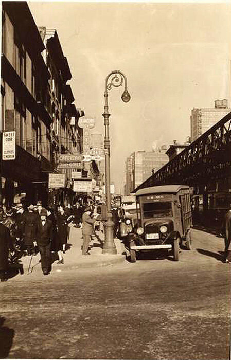 Sixth Avenue, north from W. 24th Street, showing the 'El' structure darkening the street