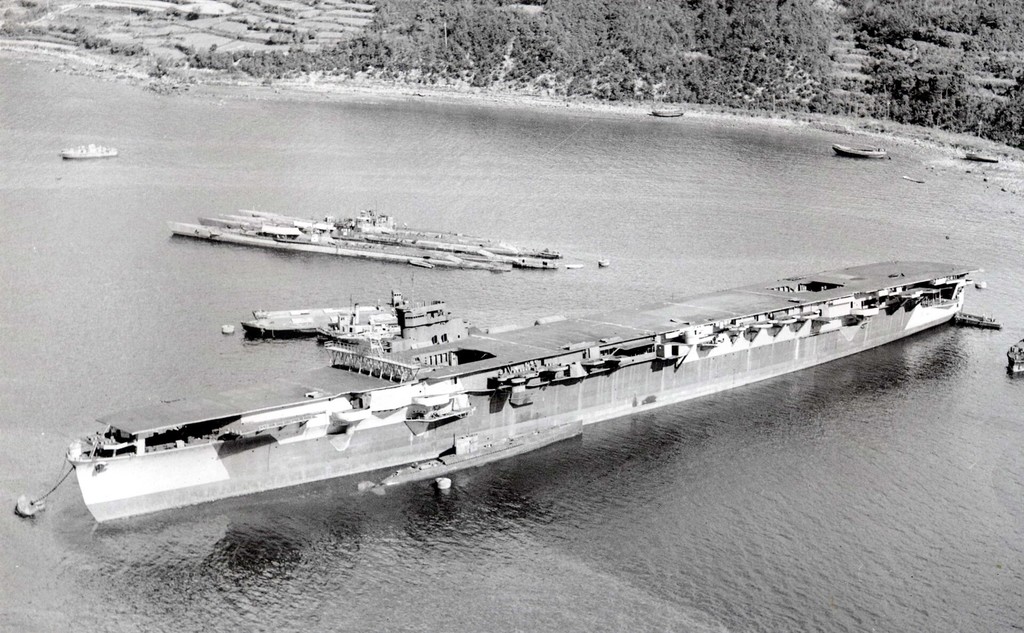 Unfinished aircraft carrier (IJN Kasagi) laying over