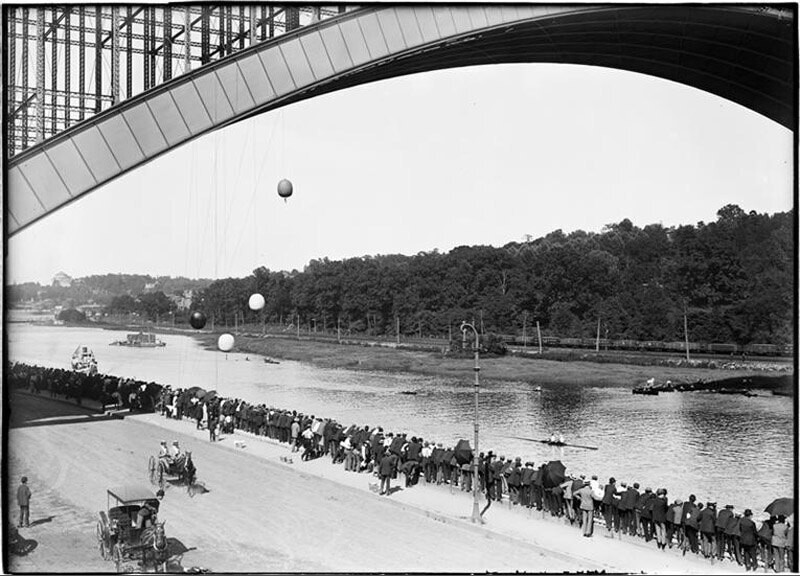 Crowds watching boat races under Washington Bridge, Harlem River