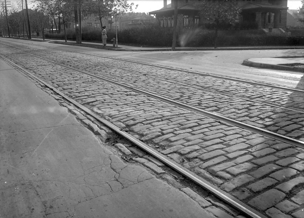 View of paving between tracks on Shady Avenue at Solway Street, looking south