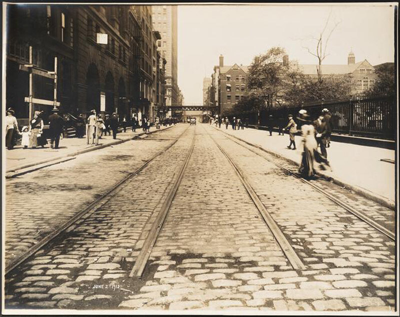 Fulton Street and Broadway. Street view looking west