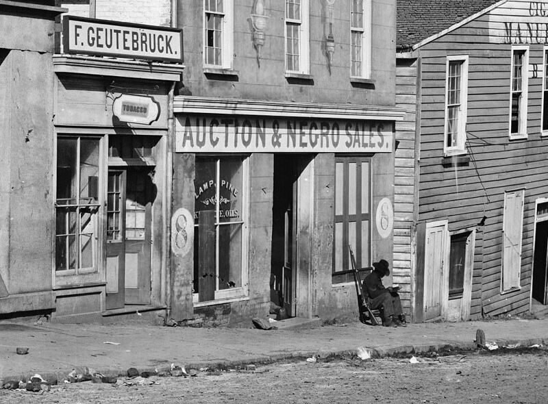 Exterior of a Shop with a Sign 'Auction & Negro Sales' in Whitehall Street, Atlanta
