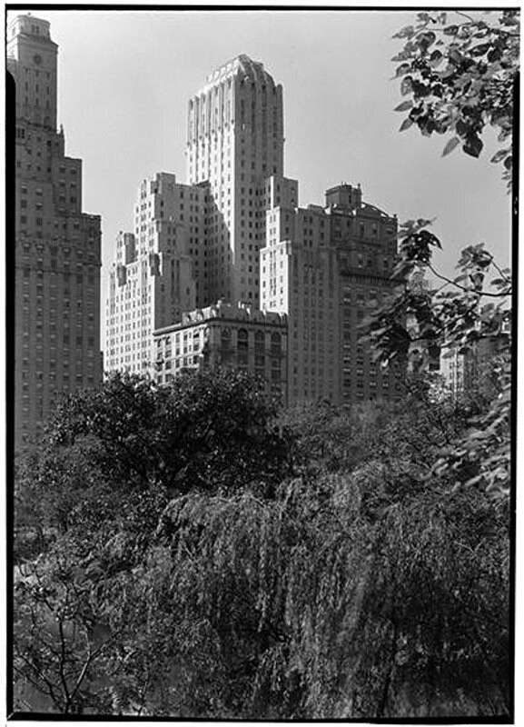 Barbizon Plaza Hotel. Exterior from Central Park over trees.