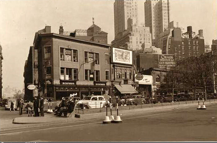 Broadway at the South east corner of 64th Street, showing towers of Hotel Mayflower