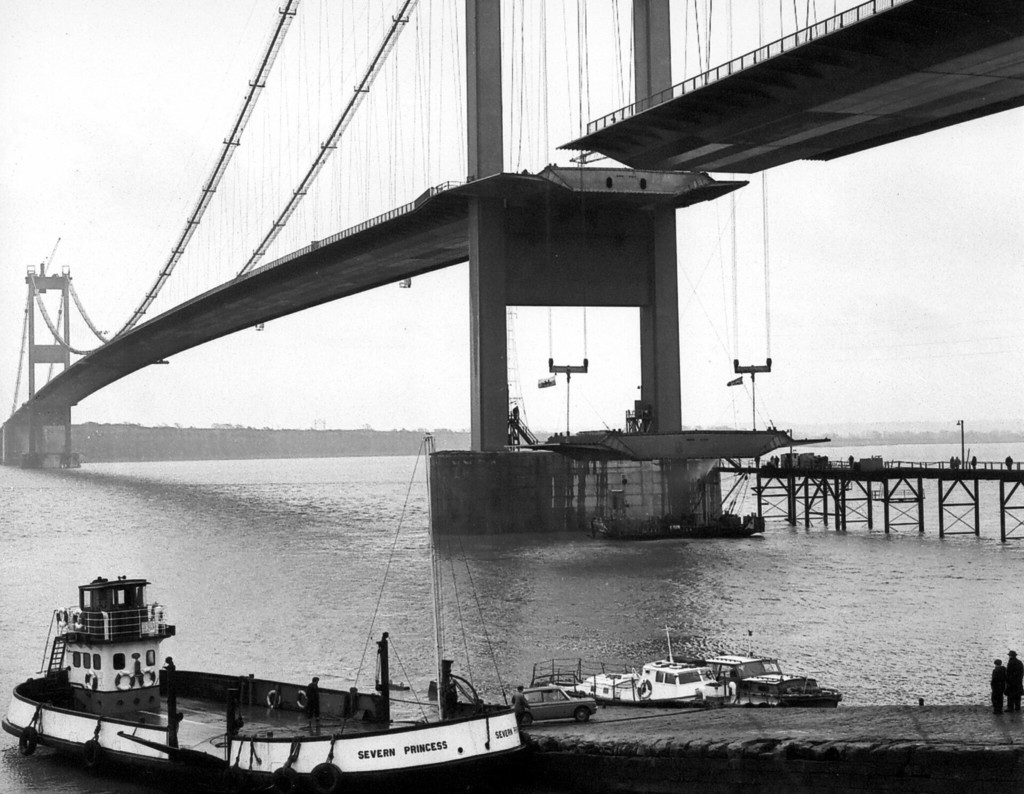 The Severn bridge towers over the ferry