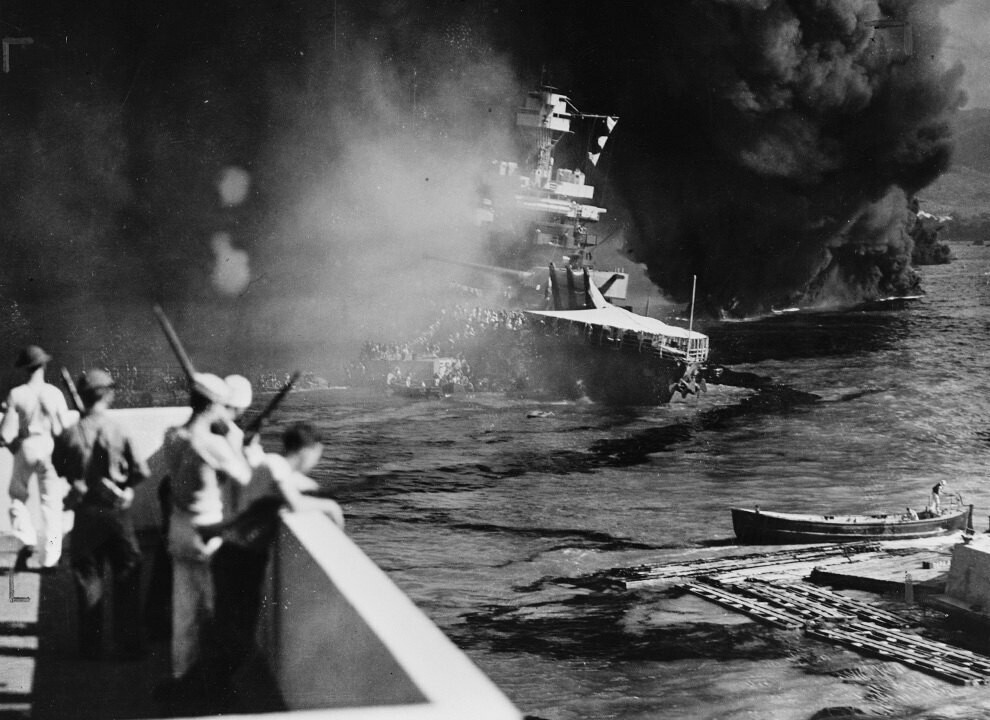 The USS California on fire in Pearl Harbor after the Japanese attack