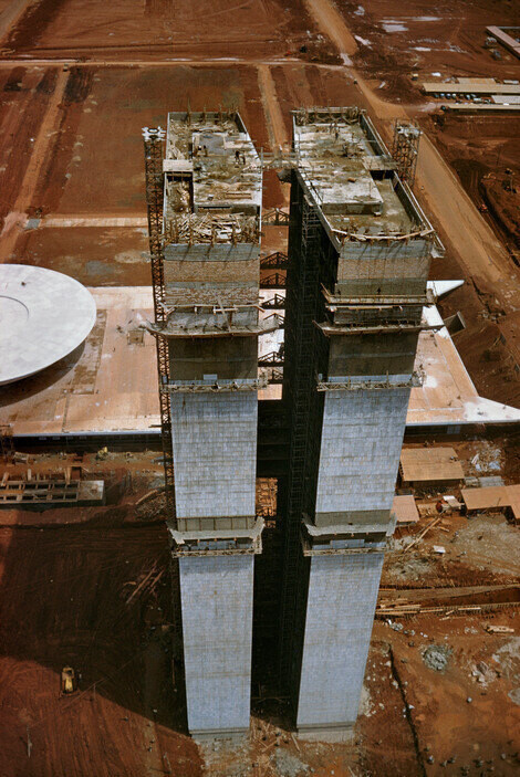 28-story twin towers of the Secretariat under construction