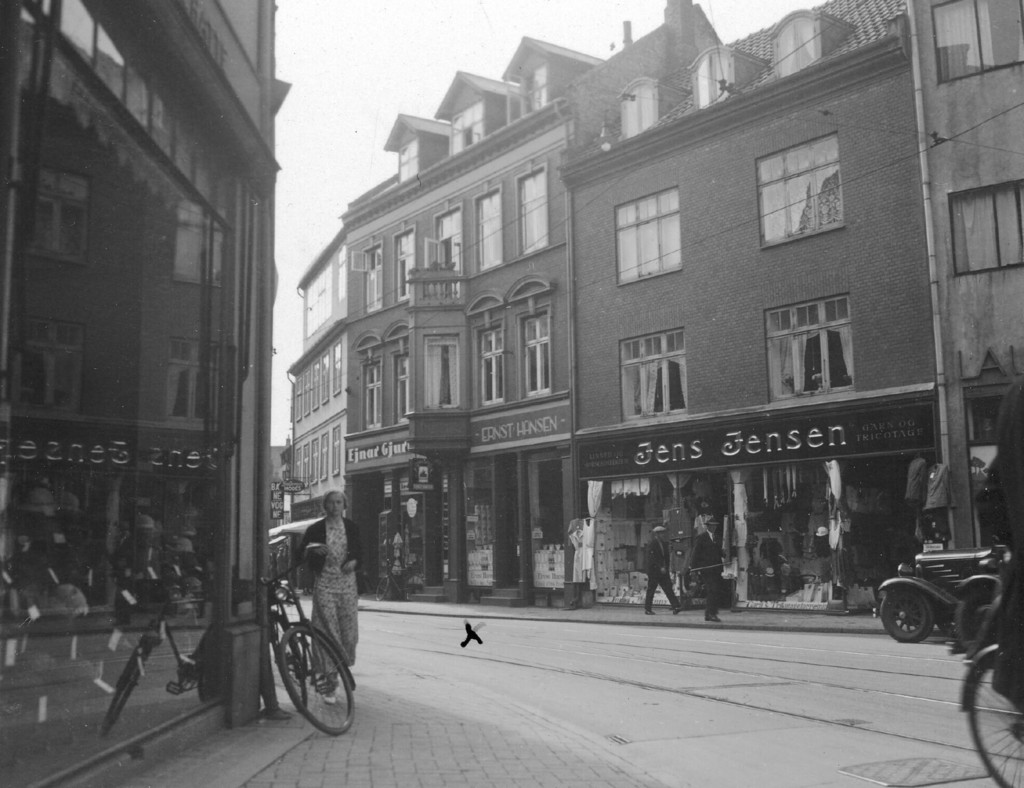 Husrækker i Nørregade, with butikker i stueetagen