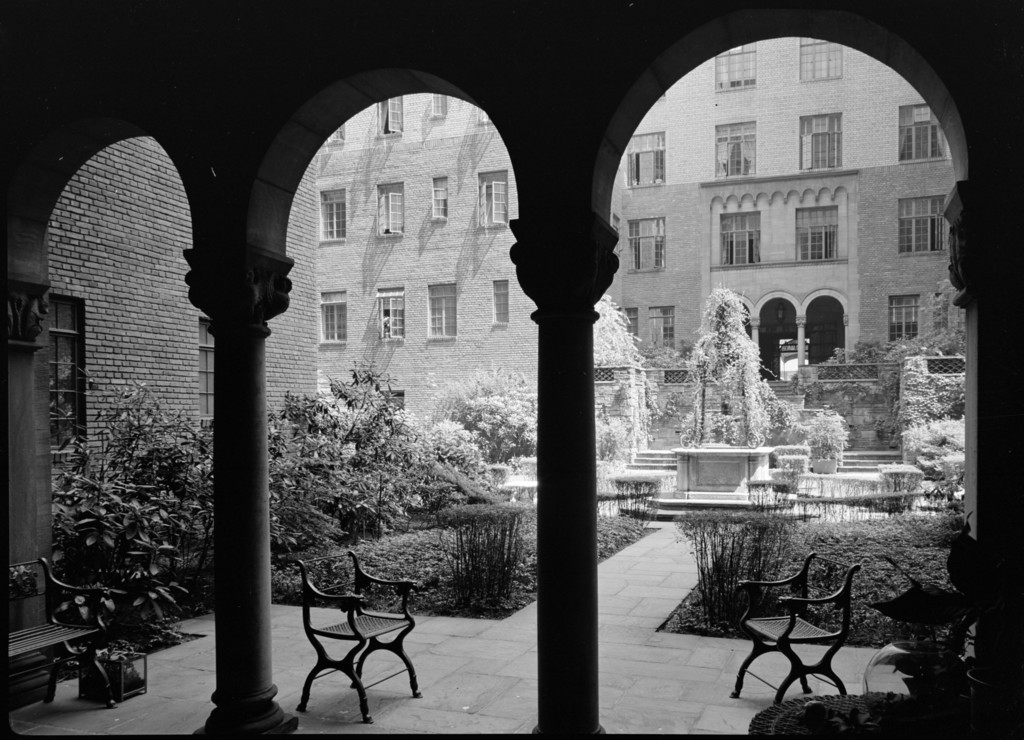 115 East 67th Street. Garden from 67th Street through arches