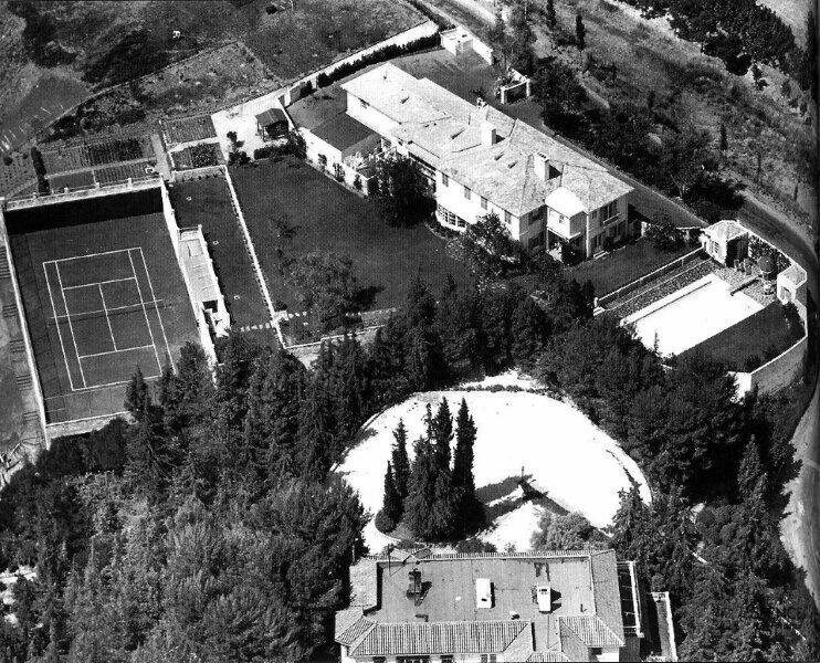 Top view of tennis courts and pool in the estate of Charlie Chaplin