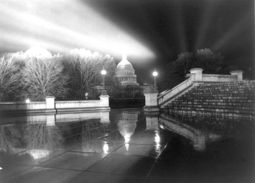 Night view of the Capitol Building in the rain. Picture taken from the steps of Neptune Plaza