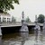 Blauwbrug over de Amstel, links Muziektheater. Rechts Amstel 31 - 35
