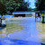 Flooded car park and the Information Bureau kiosk