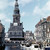 Alkmaar. Een gracht en de toren van de Waag