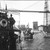 Mr. Poincaré sous le pont transbordeur (à bord d'un bateau à vapeur)