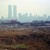 Industrial wasteland with the World Trade Center and Lower Manhattan in the distance