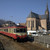 Un train passe l'église Saint-Joseph à Colmar