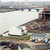 Chelsea Harbour under construction. Battersea Railway Bridge. View from Lots Road power station