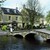 A pedestrian bridge over the River Windrush in Bourton-on-the-Water