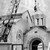 Crane lifts dome out of church and onto roof