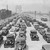 Cars line up near the toll gate on Randall's Island at opening of the Triboro Bridge