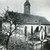 Johanneskirche, Ansicht von Westen. Im Hintergrund Turm der Sankt-Nikolai-Kirche