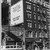 View of [John Albok's] tailor shop at 1392 Madison Avenue with billboard of John Albok's New York