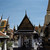 Wat Phra Kaeo, left entrance with 2 yaksha, right golden Chedi