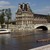 Course d'aviron sur la Seine aux abords du musée du Louvre